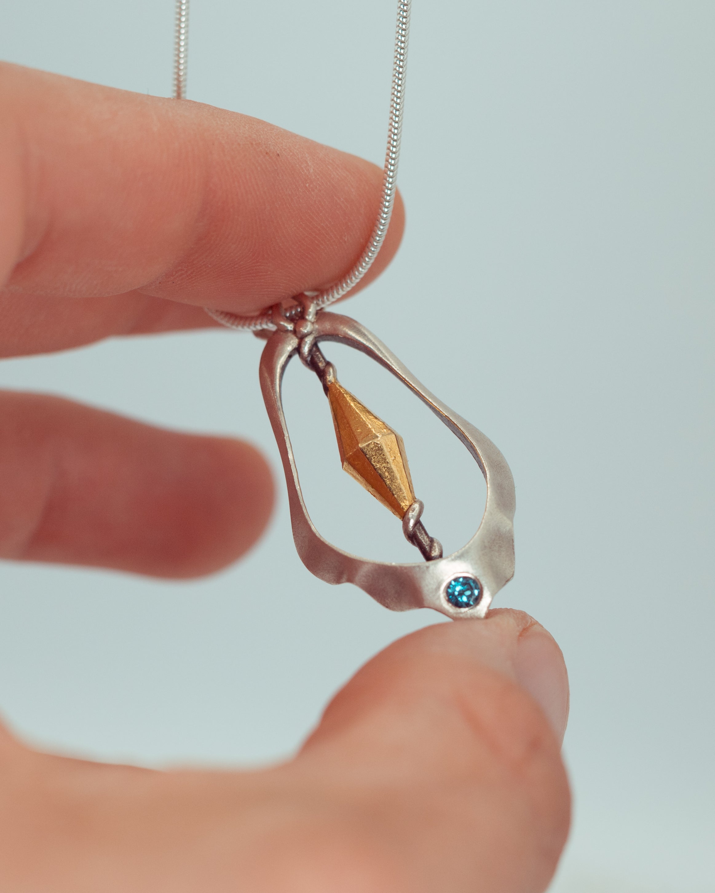 Visionary Source - Blue Topaz Pendant