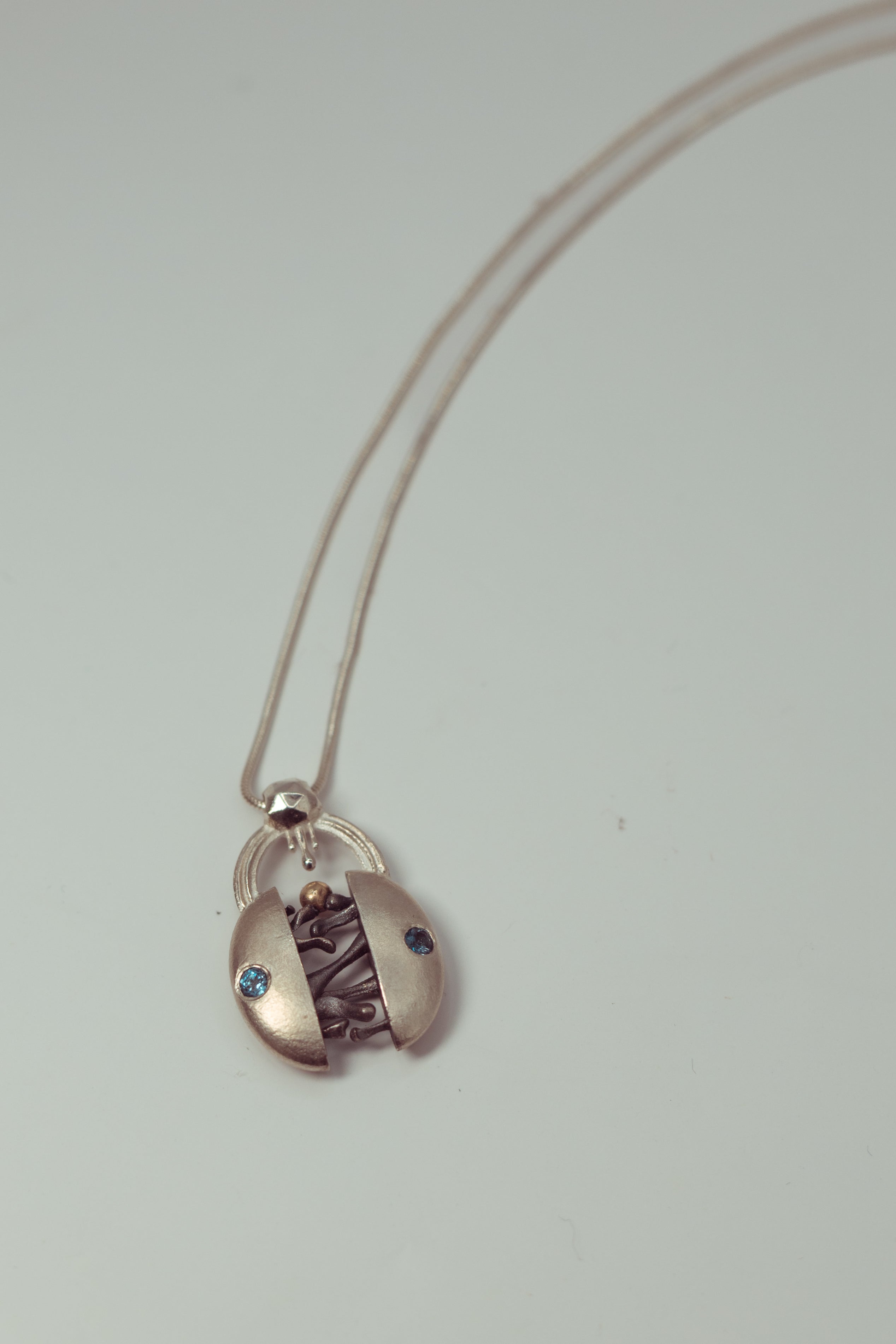 Eternal Unity Necklace — Sterling Silver, 9ct Gold & Blue Topaz
