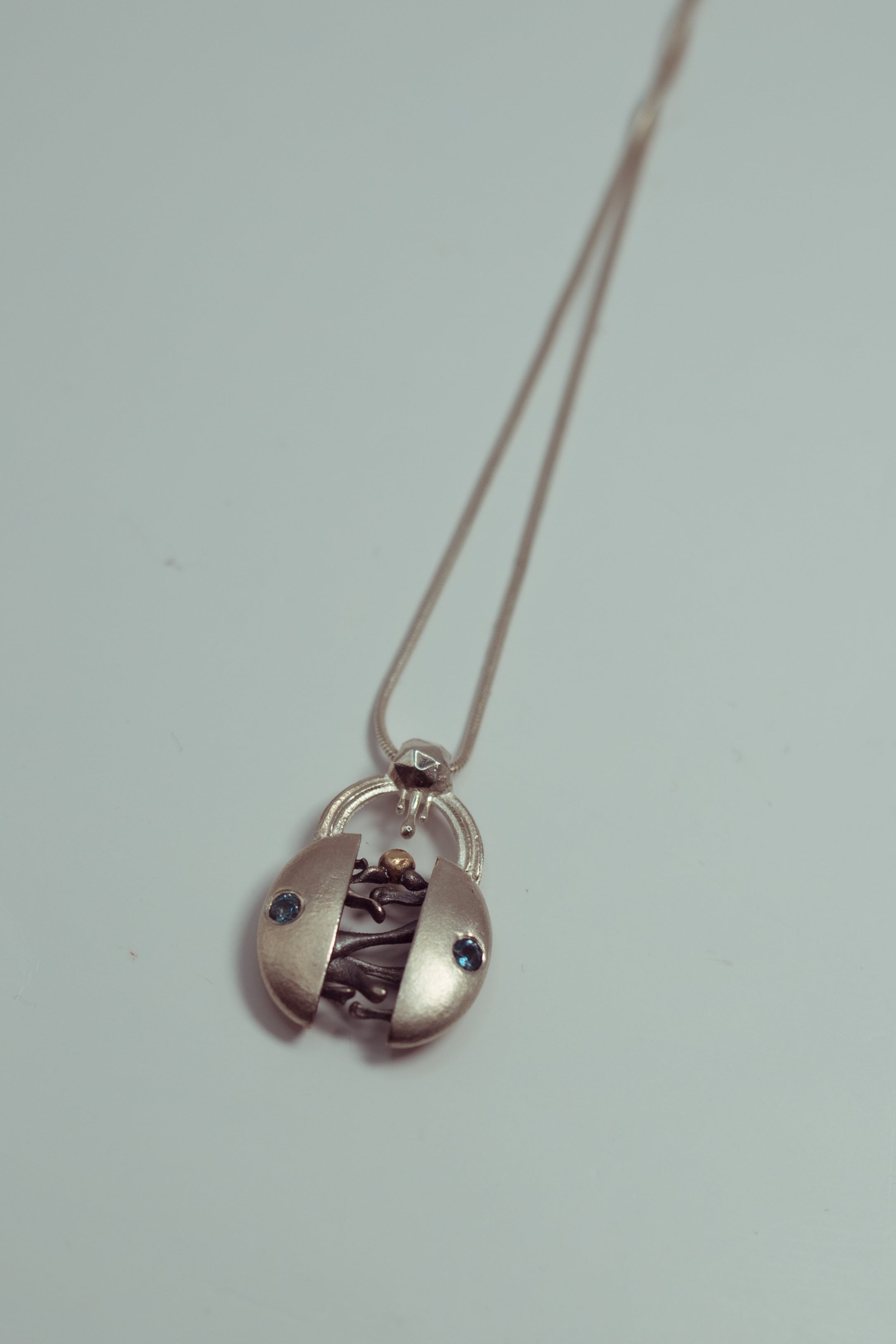 Eternal Unity Necklace — Sterling Silver, 9ct Gold & Blue Topaz